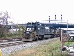 NS 8566 leads a northbound train past the signals at Elm